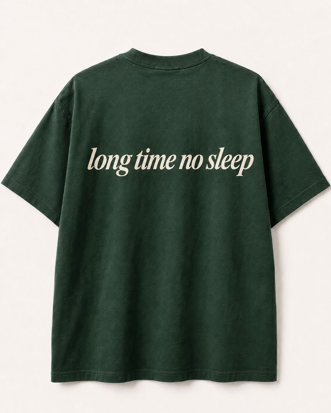 Back of forest green SORRY BABY shirt reading long time no sleep in lowercase serif italic