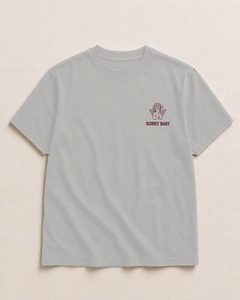 Front logo of the oat grey shirt