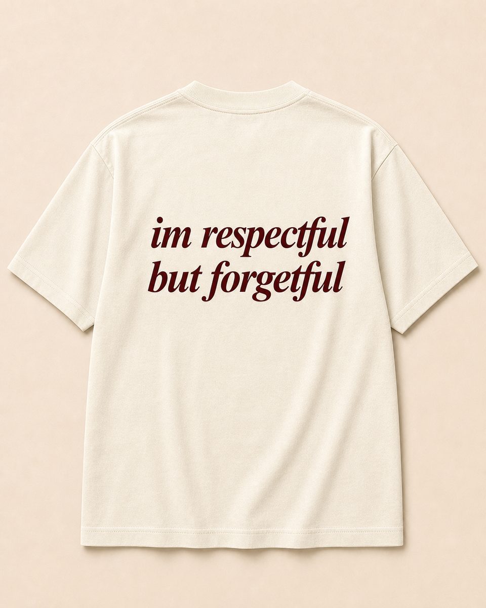 Back of cream SORRY BABY shirt reading im respectful but forgetful in lowercase serif italic